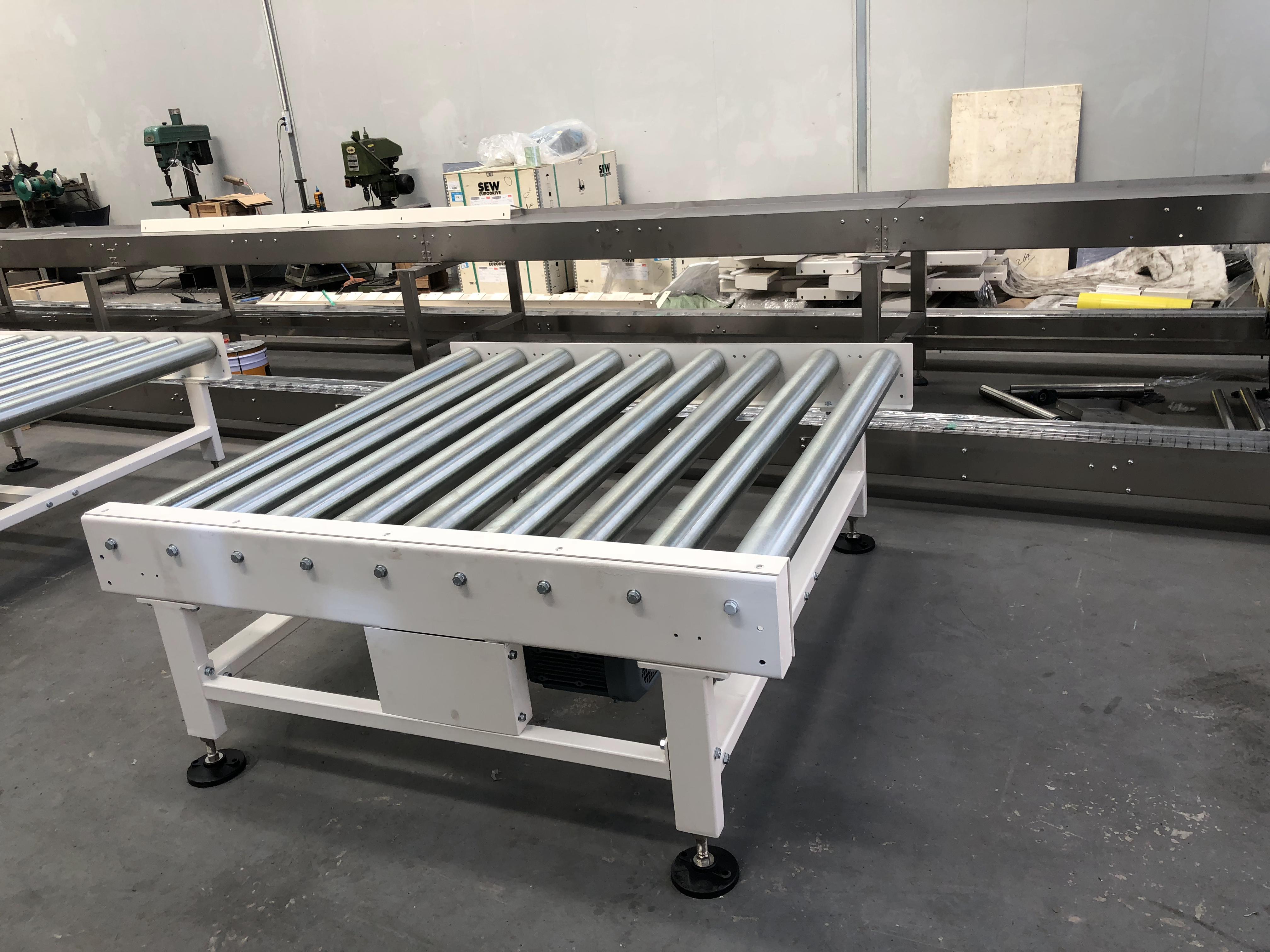 机加工滚筒输送机给料装置的浅析